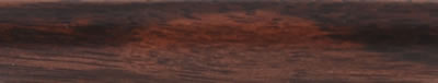 A turned strip of cocobolo: deep red-brown with dark, near-black streaks running along the grain.